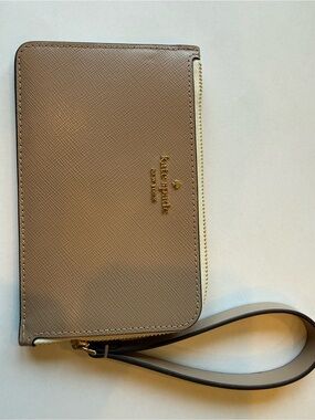 SOLD: Kate Spade taupe and gold zip wristband